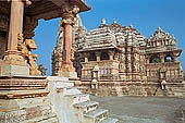 Khajuraho - Jagadambi temple and the small Mahadeva temple on the foreground on the same platform 